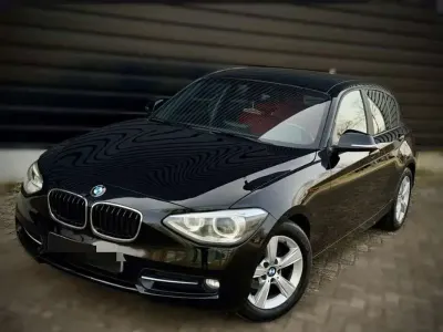 Usado BMW 116 Sport Line 136 CV (100 kW) 2013 Negro Utilitario