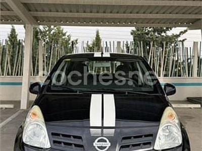 Usado Nissan Pixo Acenta 68 CV (50 kW) 2010 Negro Utilitario