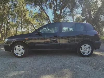 Usado Nissan Almera Comfort 90 CV (66 kW) 2001 Negro Berlina
