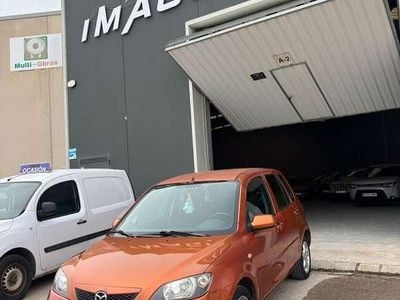 Usado Mazda 2 82 CV (60 kW) 2005 Naranja Utilitario