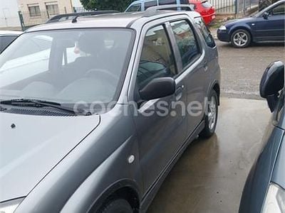 Usado Suzuki Ignis 99 CV (72 kW) 2004 Gris / plata Utilitario