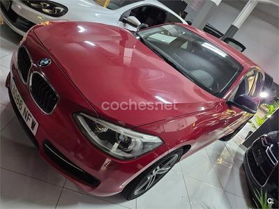 Usado BMW 118 Sport Line 143 CV (105 kW) 2012 Rojo Utilitario