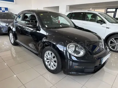 Usado VW Beetle Design 105 CV (77 kW) 2012 Negro Utilitario