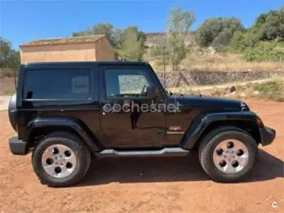 Usado Jeep Wrangler Sahara 200 CV (147 kW) 2014 Negro SUV