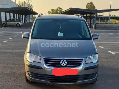 Usado VW Touran Advance 105 CV (77 kW) 2008 Granate Monovolumen