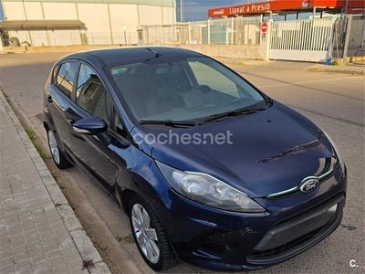 Usado Ford Fiesta Trend 82 CV (60 kW) 2012 Azul Utilitario