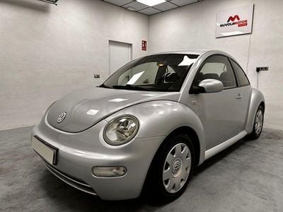 Usado VW New Beetle 102 CV (75 kW) 2003 Gris / plata Utilitario