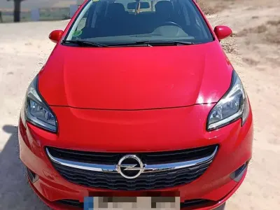 Usado Opel Corsa Selective 95 CV (69 kW) 2016 Rojo Utilitario