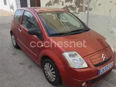 Usado Citroën C2 61 CV (44 kW) 2004 Rojo Utilitario