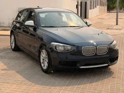 Usado BMW 116 136 CV (100 kW) 2012 Azul Utilitario