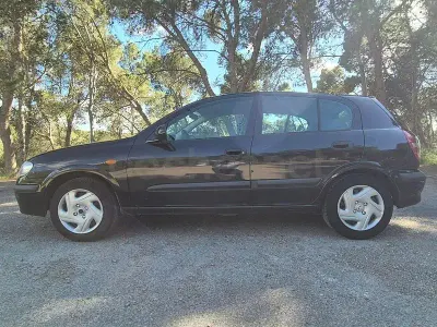 Usado Nissan Almera Comfort 90 CV (66 kW) 2001 Negro Berlina