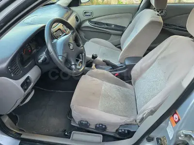 Usado Nissan Almera 110 CV (80 kW) 2003 Gris / plata Berlina