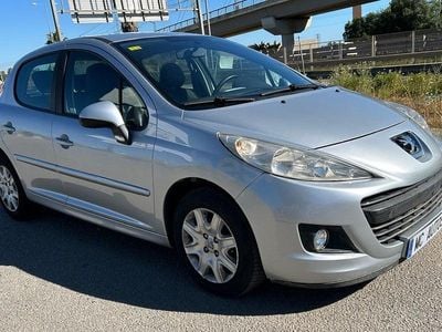 Usado Peugeot 207 70 CV (51 kW) 2010 Gris / plata Berlina