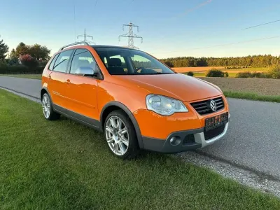 Usado VW Polo Cross 105 CV (77 kW) 2006 Naranja Utilitario