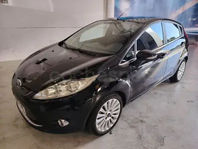 Usado Ford Fiesta Titanium 90 CV (66 kW) 2009 Negro Berlina