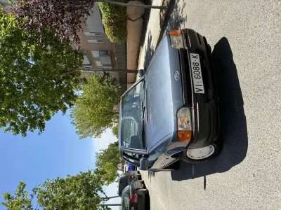 Usado Ford Escort 88 CV (64 kW) 1989 Gris Utilitario