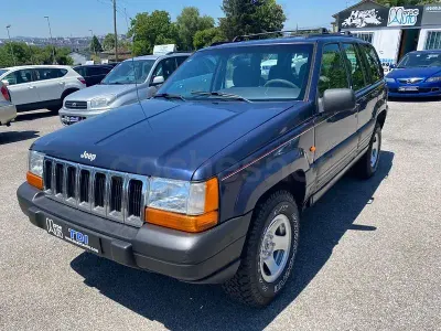 Usado Jeep Grand Cherokee Laredo 115 CV (84 kW) 1997 Azul SUV