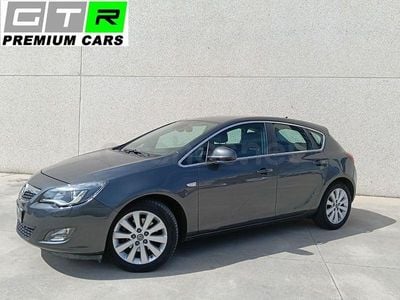 Używany Opel Astra Cosmo 110 KM (80 kW) 2012 Szary Sedan/Limuzyna