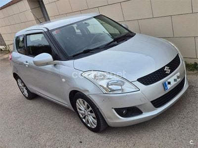 Usado Suzuki Swift GLX 95 CV (69 kW) 2012 Gris / plata Utilitario