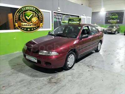 Usado Mitsubishi Carisma 100 CV (73 kW) 1999 Granate Berlina