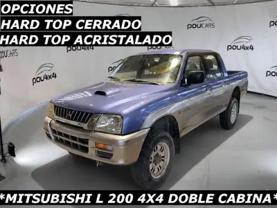 Usado Mitsubishi L200 99 CV (72 kW) 1998 Azul Pickup/Camioneta