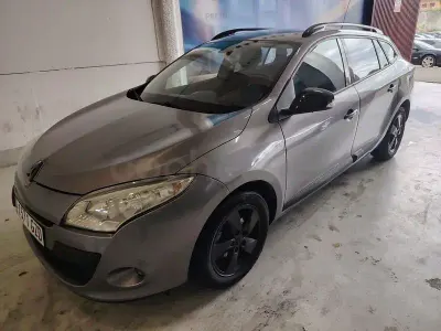 Occasion Renault Mégane Dynamique 105 PK (77 kW) 2010 Grijs Sedan