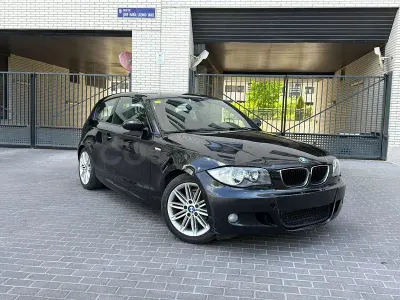 Usado BMW 116 115 CV (84 kW) 2010 Negro Utilitario