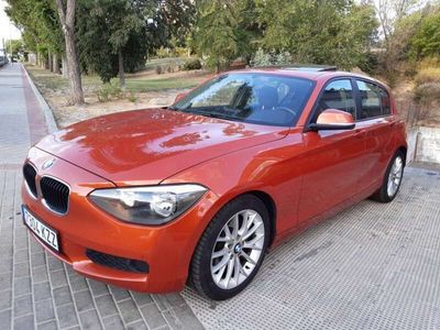 Usado BMW 118 170 CV (125 kW) 2012 Naranja Utilitario