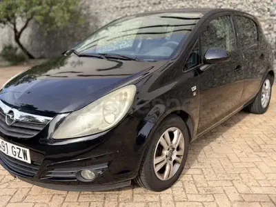 Usado Opel Corsa 85 CV (62 kW) 2010 Negro Utilitario