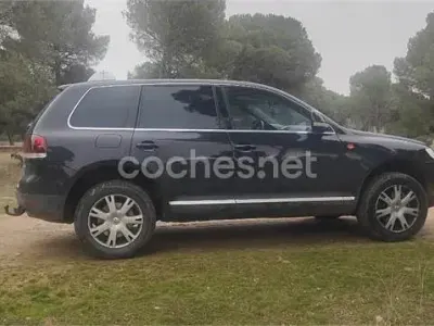 Käytetty VW Touareg 225 HP (165 kW) 2007 Musta Katumaasturi