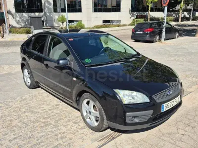Usado Ford Focus Trend 100 CV (73 kW) 2007 Negro Berlina