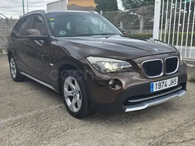 Käytetty BMW X1 Comfort Edition 177 HP (130 kW) 2010 Ruskea Katumaasturi