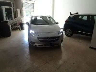Usado Opel Corsa Expression 90 CV (66 kW) 2016 Gris Utilitario