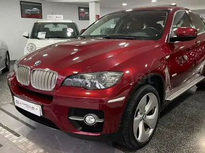 Käytetty BMW ActiveHybrid X6 Comfort Edition 485 HP (356 kW) 2011 Punainen Katumaasturi