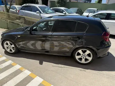Usado BMW 118 M Sport 143 CV (105 kW) 2011 Negro Utilitario