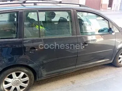 Usado VW Touran Highline 140 CV (102 kW) 2006 Negro Monovolumen