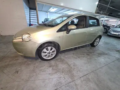 Usado Fiat Grande Punto Active 95 CV (69 kW) 2006 Beige Utilitario