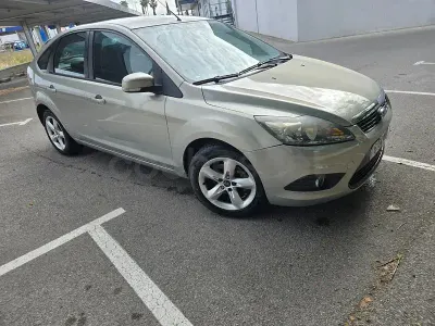 Używany Ford Focus Titanium 109 KM (80 kW) 2011 Beżowy Sedan/Limuzyna