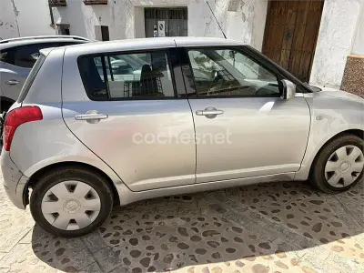 Usado Suzuki Swift GLX 92 CV (67 kW) 2009 Gris / plata Utilitario