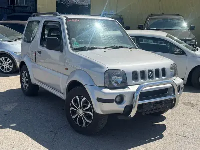 Usado Suzuki Jimny 82 CV (60 kW) 2001 Gris / plata SUV