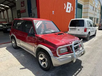 Usado Suzuki Grand Vitara 87 CV (63 kW) 1998 Granate SUV