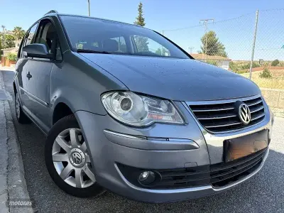 Usado VW Touran Highline 170 CV (125 kW) 2009 Azul Monovolumen