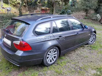 Usado BMW 318 115 CV (84 kW) 2006 Negro Familiar