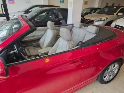Usado BMW 118 143 CV (105 kW) 2010 Rojo Utilitario
