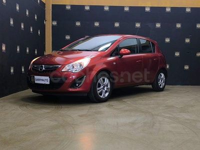 Usado Opel Corsa Selective 85 CV (62 kW) 2013 Naranja Utilitario