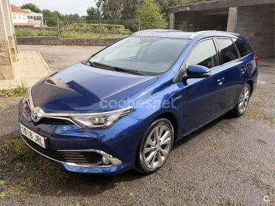 Usado Toyota Auris Hybrid Advance 136 CV (100 kW) 2016 Azul Familiar