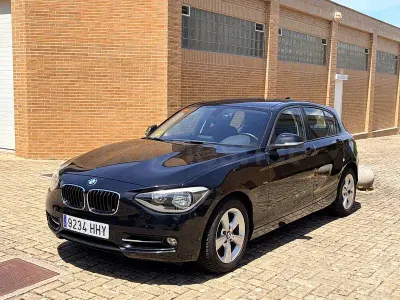 Usado BMW 118 Sport Line 143 CV (105 kW) 2012 Negro Utilitario