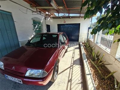 Usado Citroën AX Tonic 58 CV (42 kW) 1996 Granate Utilitario