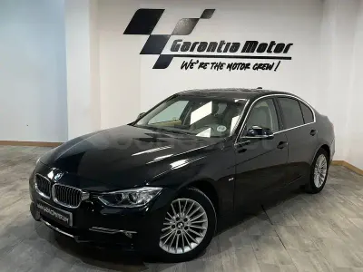 Begagnad BMW 316 Luxury Line 116 HK (85 kW) 2013 Svart Sedan