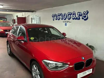 Usado BMW 116 116 CV (85 kW) 2012 Granate Utilitario